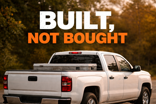 Clean white pickup truck parked outdoors with bold “Built, Not Bought” text overlay, symbolizing hard work, blue-collar pride, and the tradesman work ethic.
