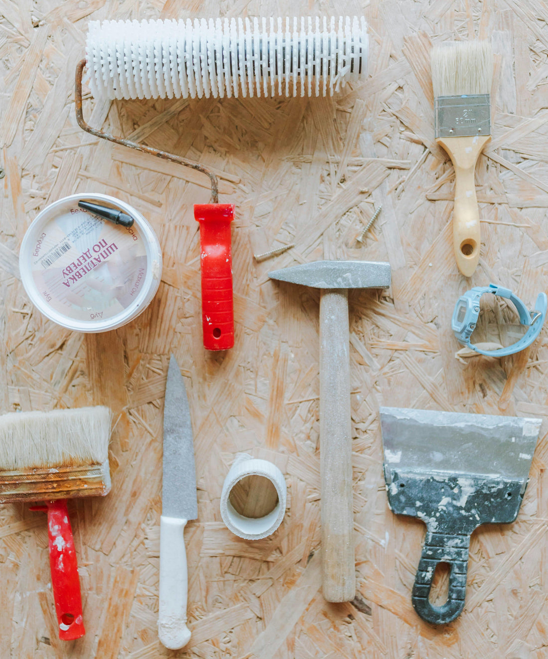 Roller, paint brush, scraper. knife. hammer