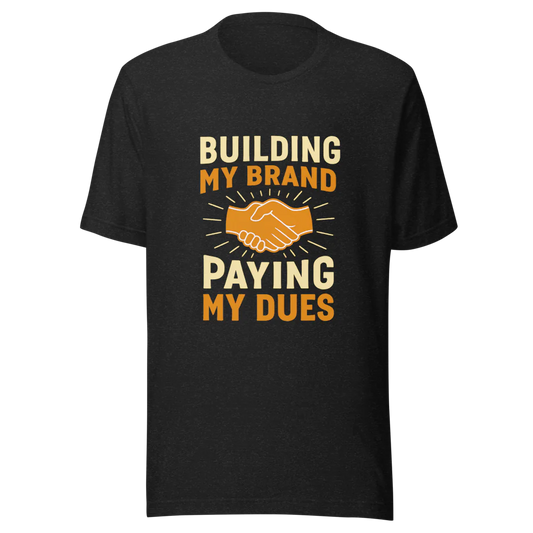 Front view of black building my brand paying my dues t-shirt