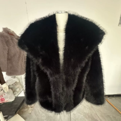 Black faux fur women’s jacket with open front design